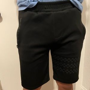 Black Athletic Public Record Big Boy Shorts with Checkered pattern on right leg